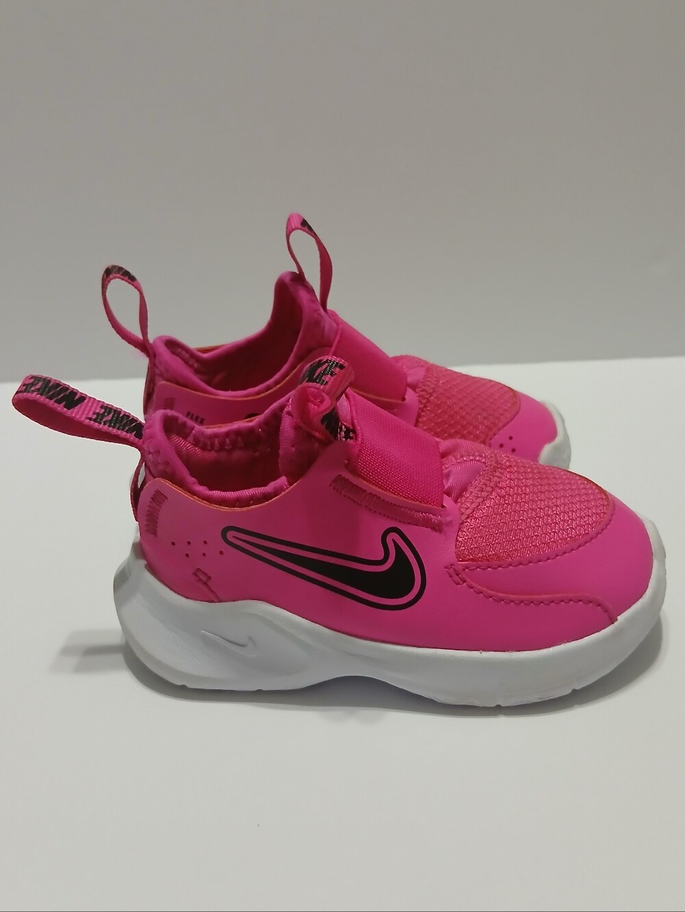 Nike Kids Pink Slip-On Sneakers with Black Swoosh Size 6c